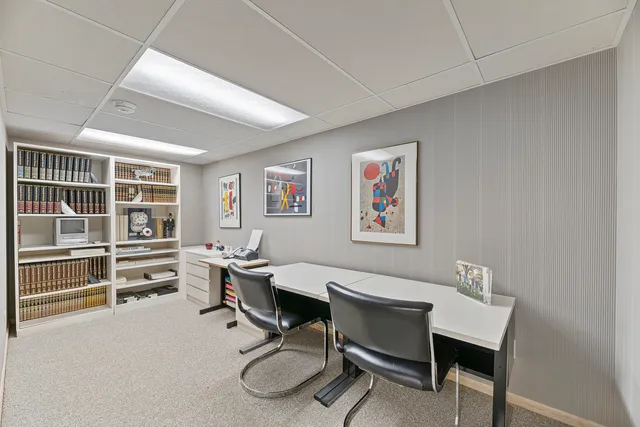 a house view with a seating space and garden