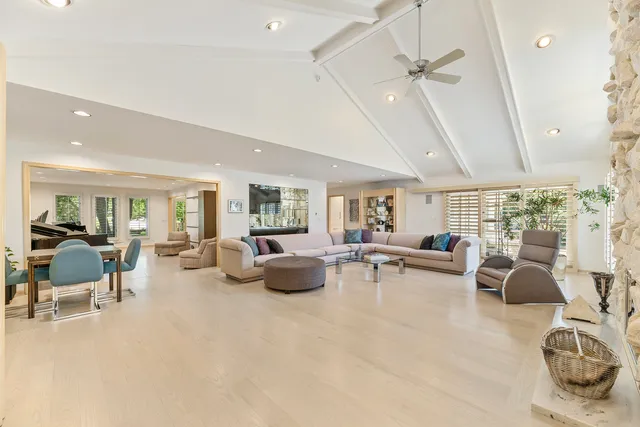 a view of a dining room with furniture and window