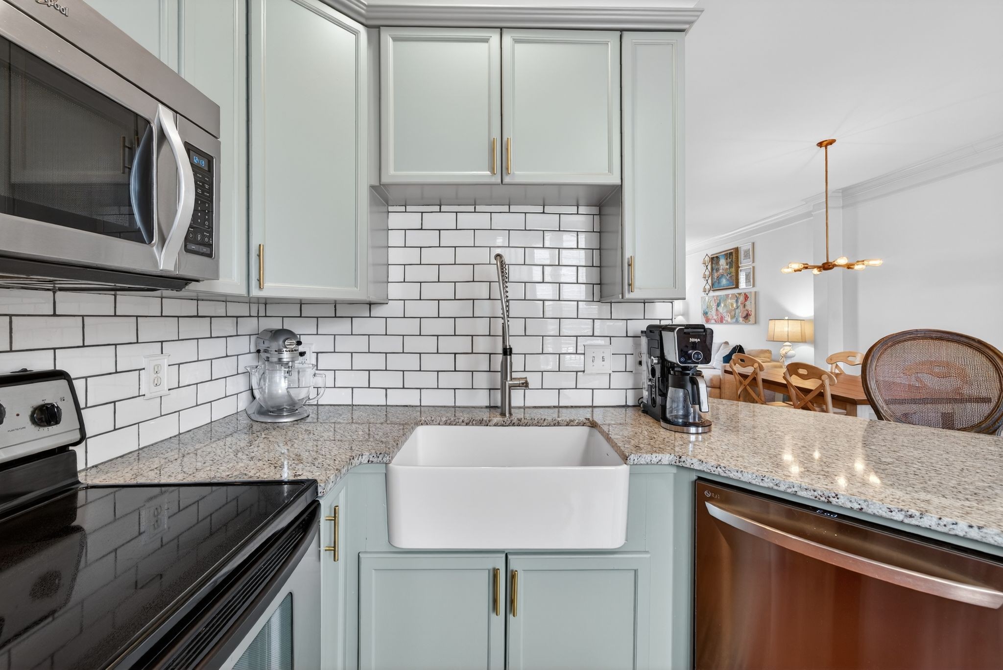 7246 Althorp Way Nashville, TN 37211 - Photo 14 of 34 a kitchen with granite countertop a sink stainless steel appliances and cabinets
