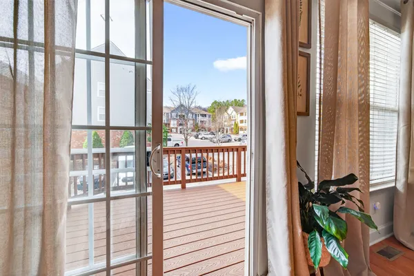 a view of a balcony with flat screen tv