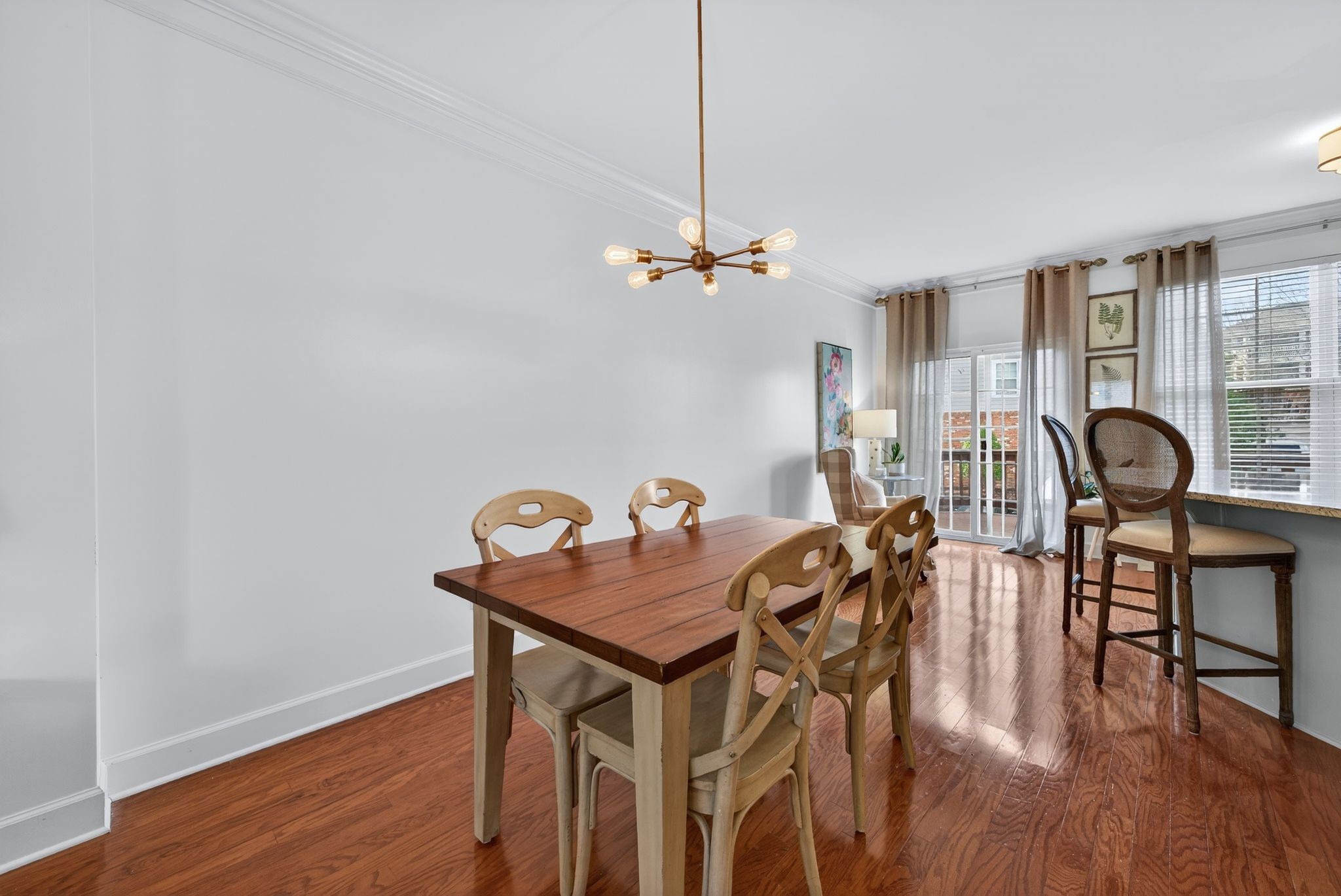 7246 Althorp Way Nashville, TN 37211 - Photo 6 of 34 a view of a dining room with furniture and wooden floor
