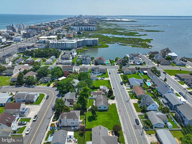 an aerial view of a houses with outdoor space