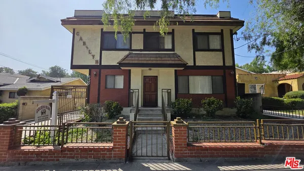 front view of a house with a small yard
