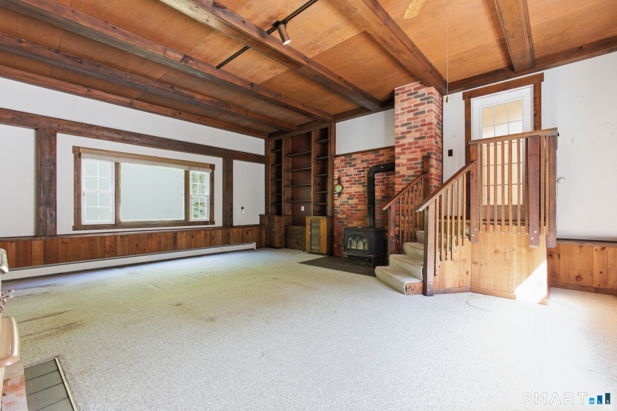 70 Mahoney Road Colchester, CT 06415 - Photo 11 of 40 a view of an empty room with a fireplace