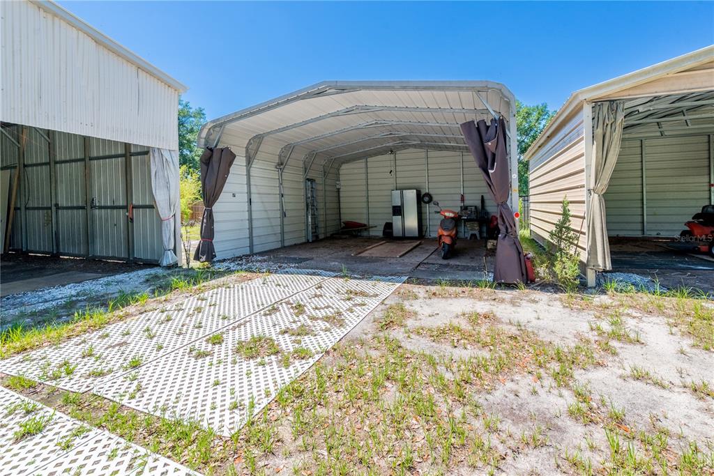 1750 Southwest 15th Street Bell, FL 32619 - Photo 29 of 34 a view of a house with backyard and porch