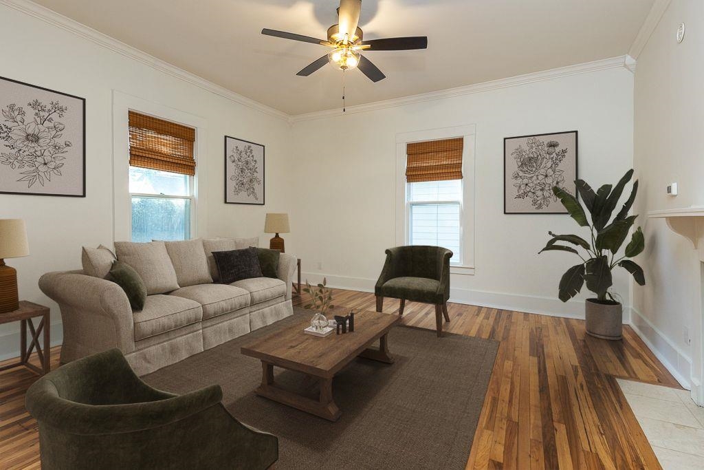 119 South Fenwick Road Memphis, TN 38111 - Photo 12 of 28 a living room with furniture a table and a potted plant