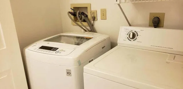a utility room with dryer and washer