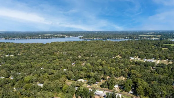 an aerial view of a houses with outdoor space
