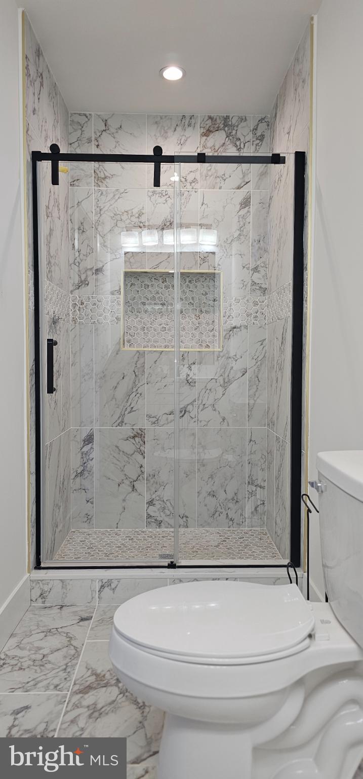 1427 Ocean Pleasantville, NJ 08232 - Photo 17 of 27 a bathroom with a shower