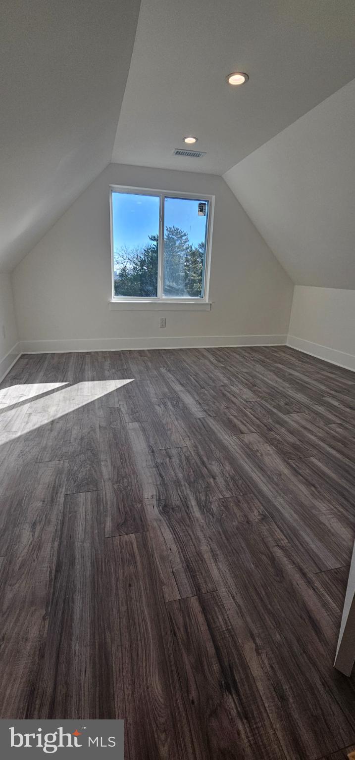 1427 Ocean Pleasantville, NJ 08232 - Photo 24 of 27 an empty room with wooden floor and windows