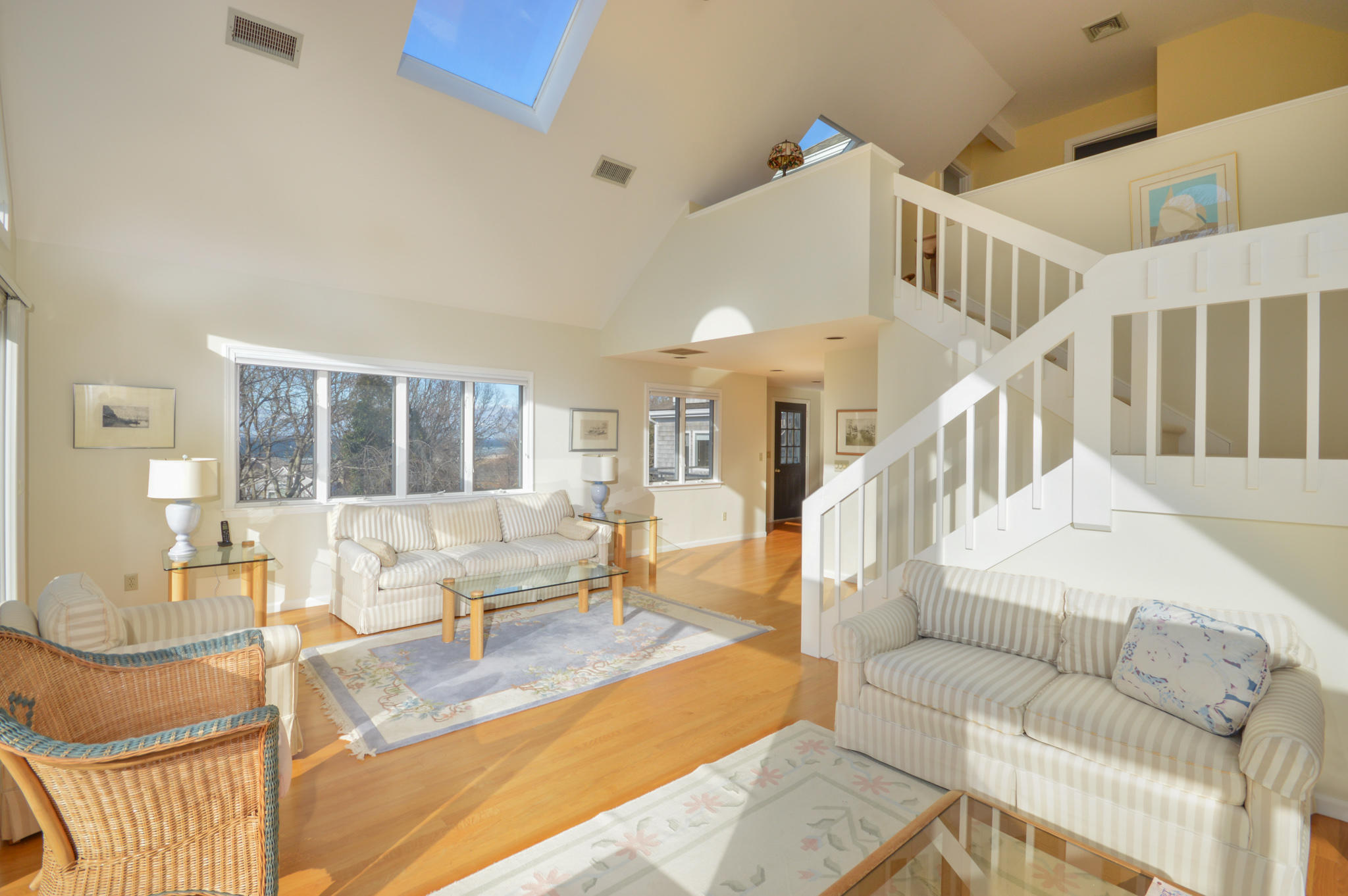 70 Indian Ridge Road Falmouth, MA 02540 - Photo 11 of 38 a living room with furniture and a large window