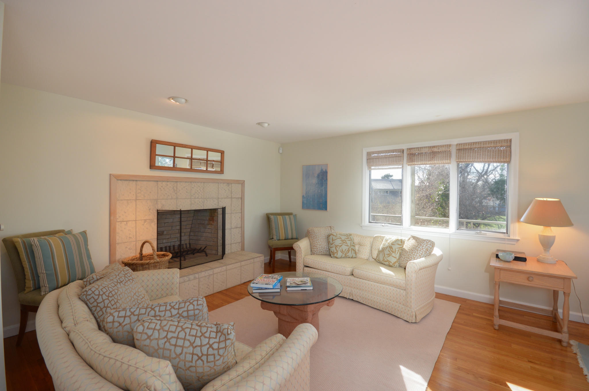 70 Indian Ridge Road Falmouth, MA 02540 - Photo 14 of 38 a living room with furniture and a fireplace