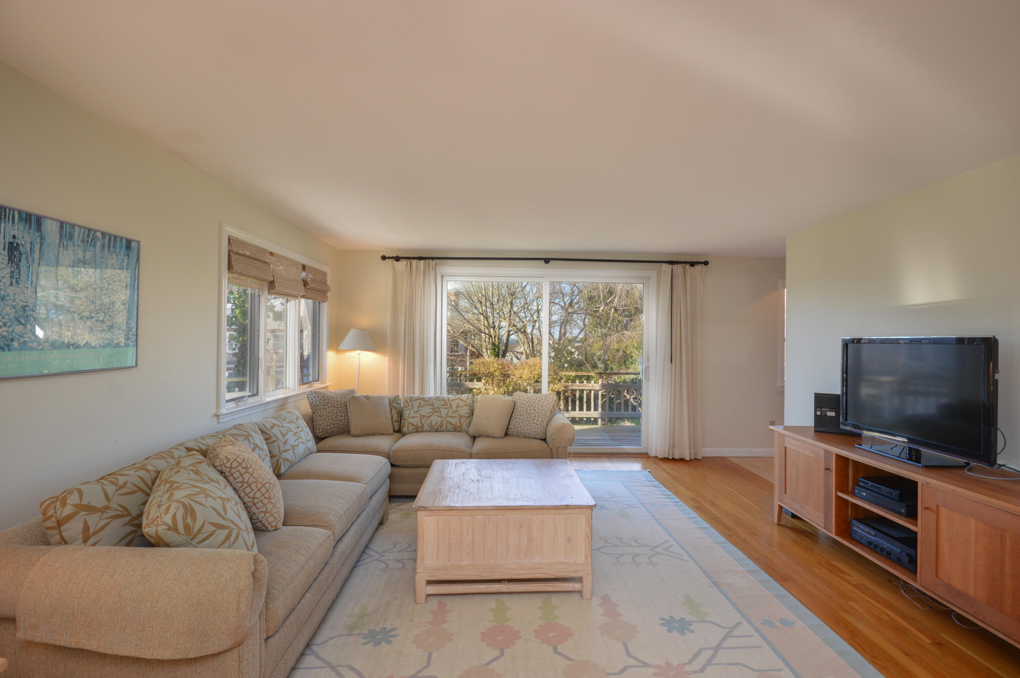 70 Indian Ridge Road Falmouth, MA 02540 - Photo 15 of 38 a living room with furniture and a flat screen tv