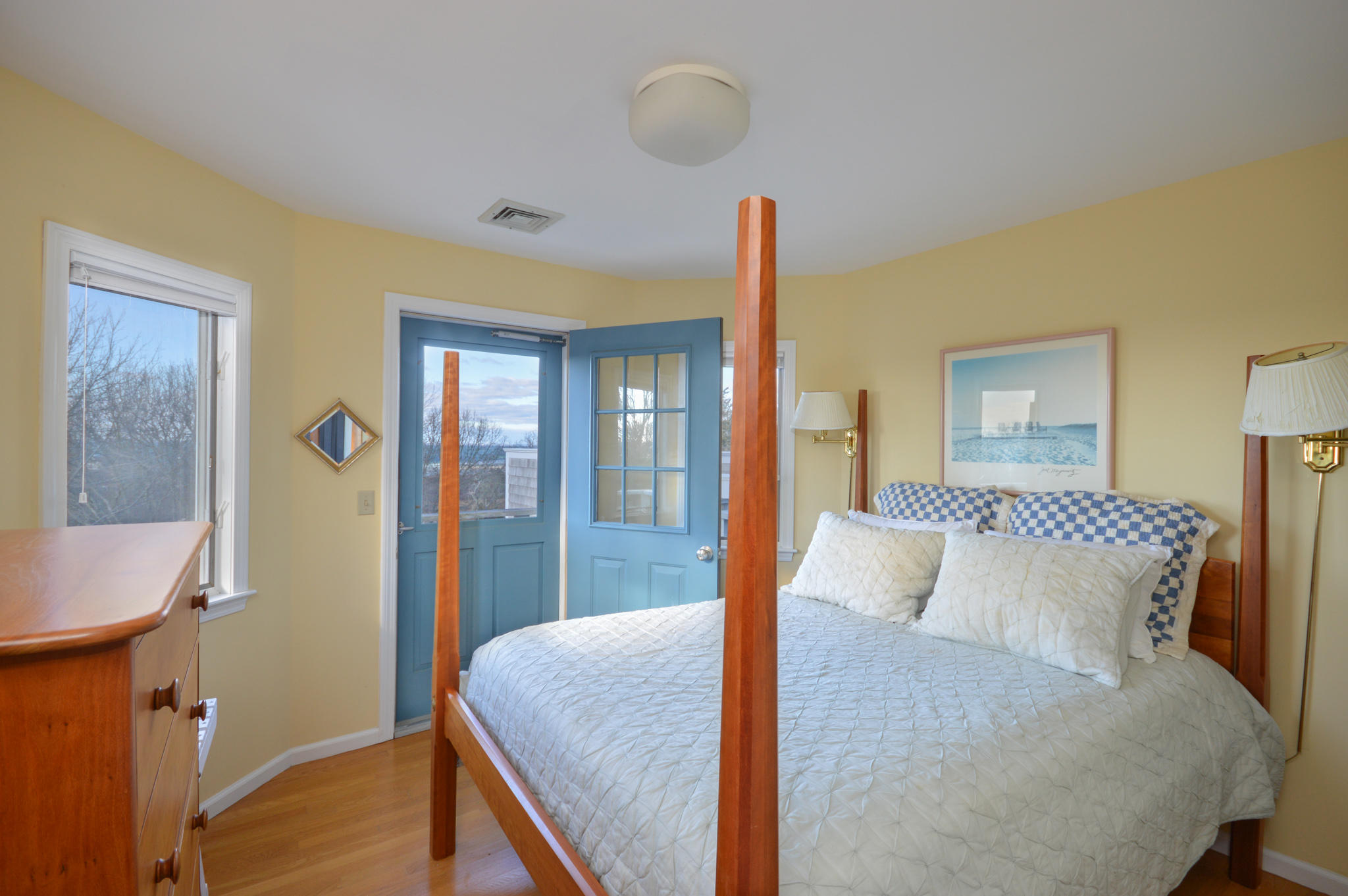 70 Indian Ridge Road Falmouth, MA 02540 - Photo 29 of 38 a bedroom with a bed and wooden floor