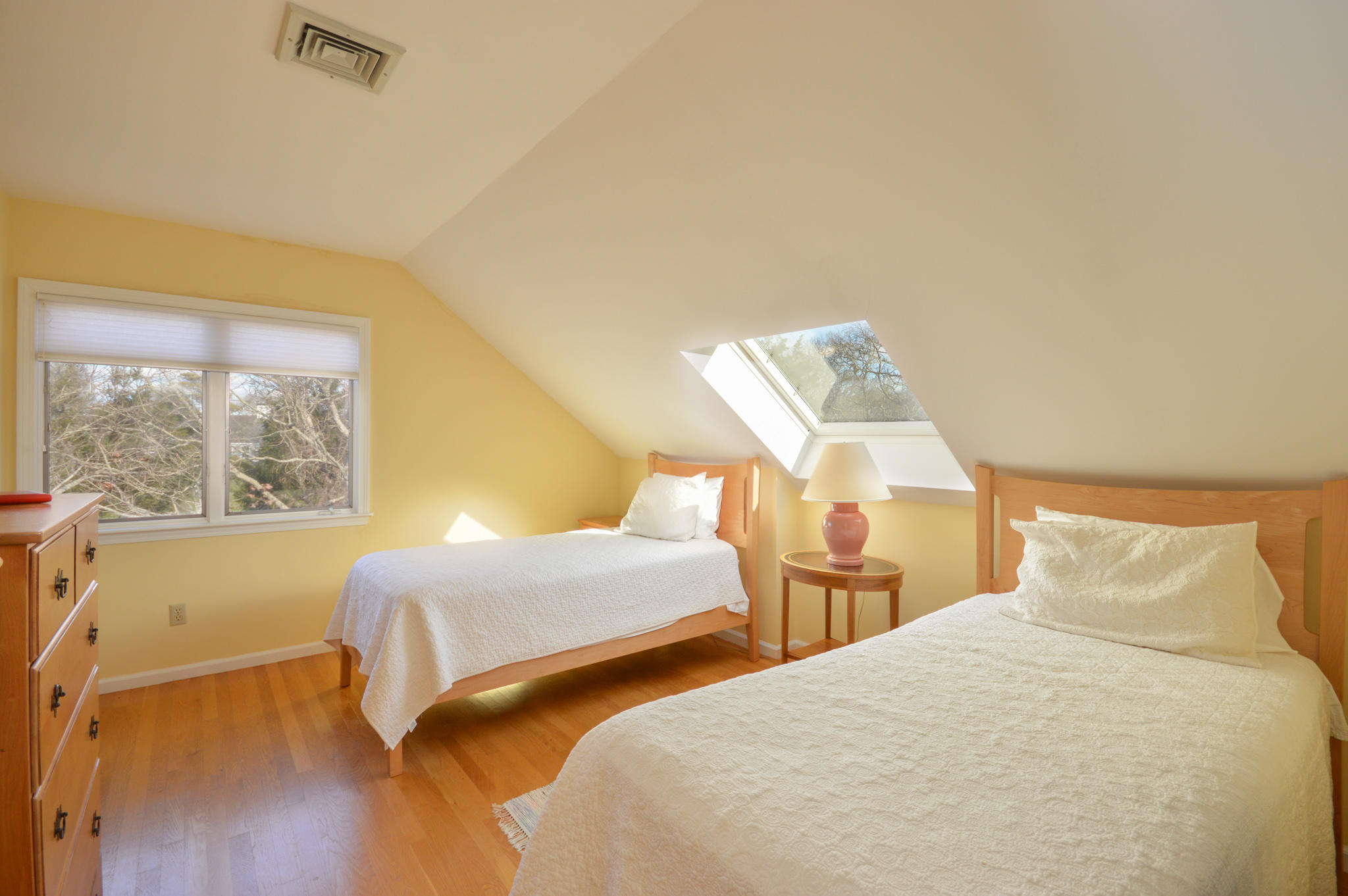 70 Indian Ridge Road Falmouth, MA 02540 - Photo 30 of 38 a bedroom with two beds and a large window