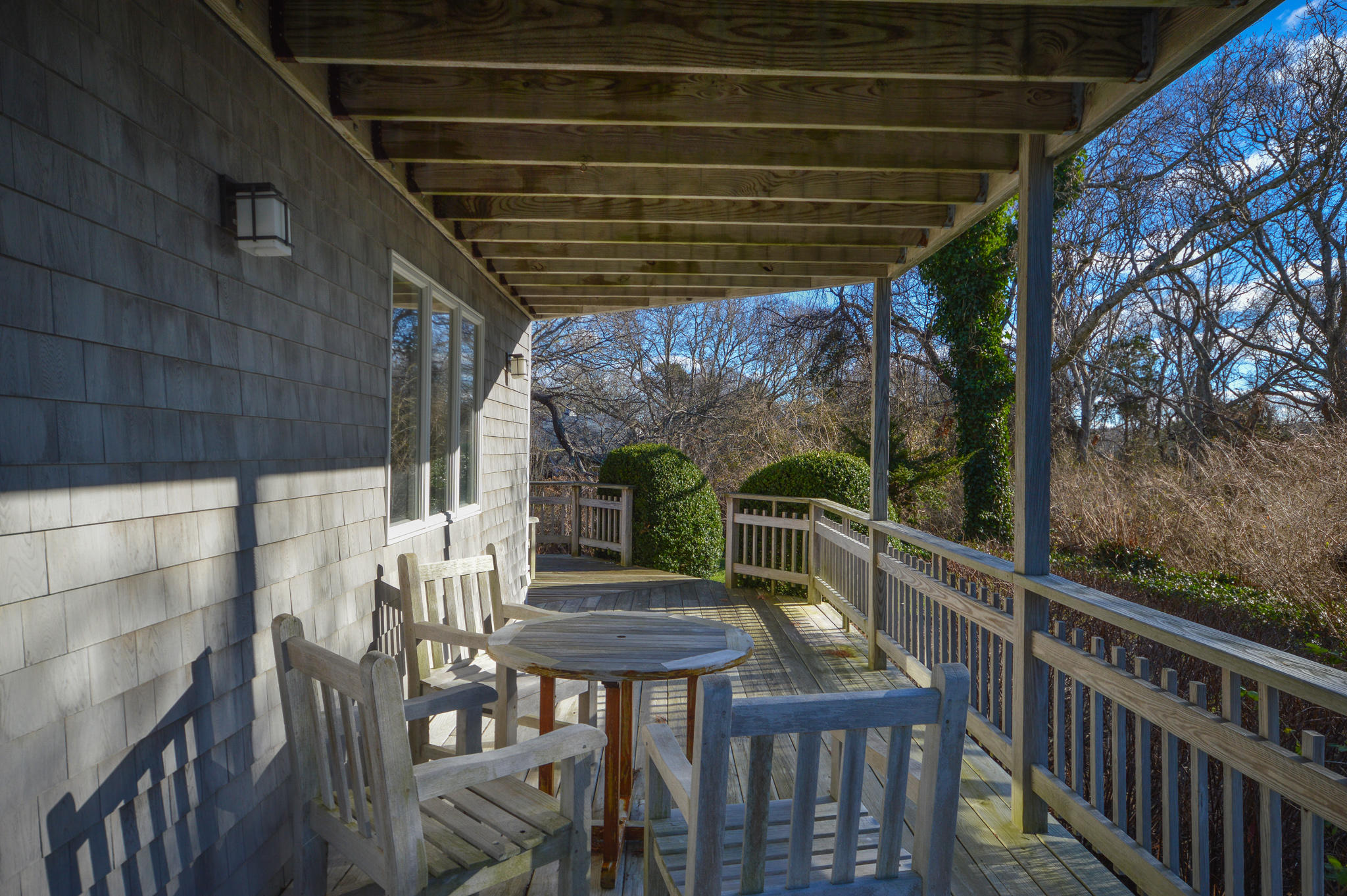 70 Indian Ridge Road Falmouth, MA 02540 - Photo 31 of 38 a view of balcony with wooden floor and outdoor seating