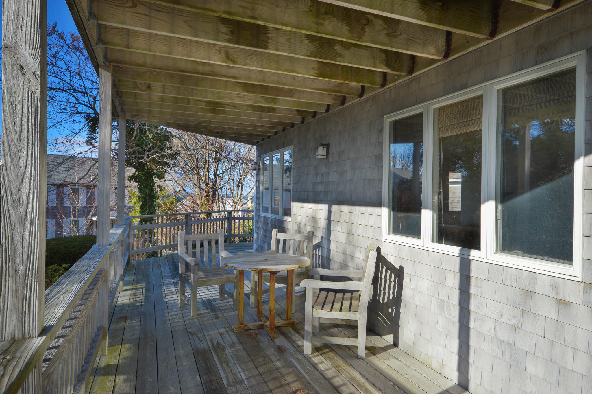 70 Indian Ridge Road Falmouth, MA 02540 - Photo 32 of 38 a view of a chairs and table in a patio