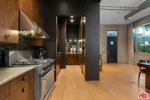 a room with a table and chairs