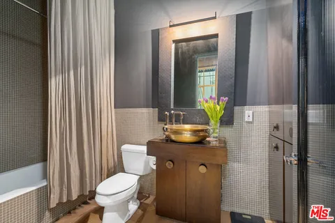 a view of a building with a street