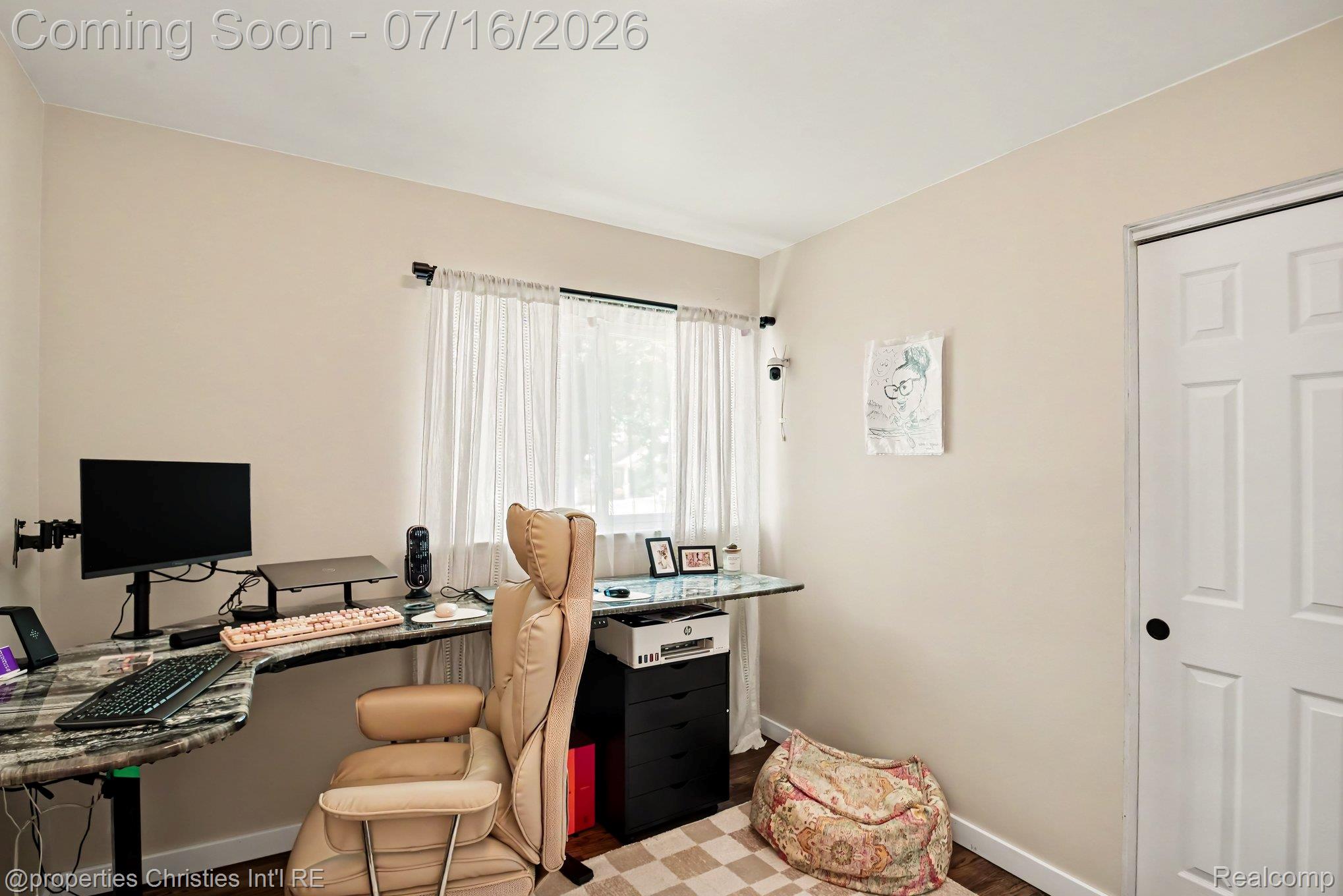 3304 Riverside Drive Port Huron, MI 48060 - Photo 19 of 26 Room featuring light-toned walls and wood-finish flooring