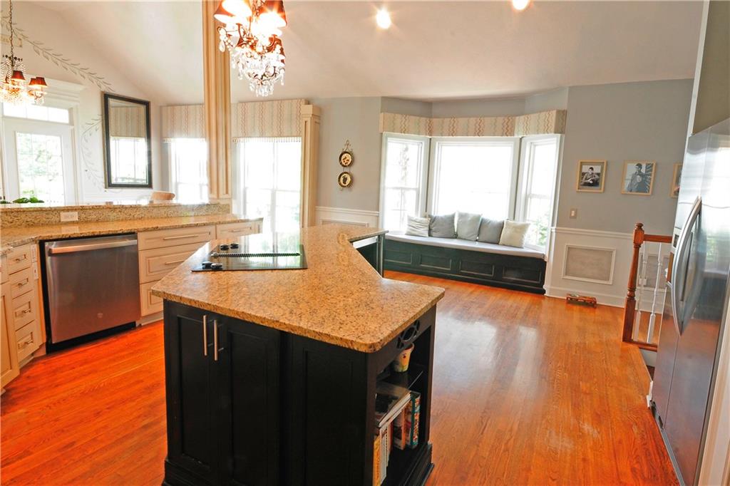 10121 Lakeview Parkway Villa Rica, GA 30180 - Photo 12 of 55 a kitchen with stainless steel appliances granite countertop a sink and a stove