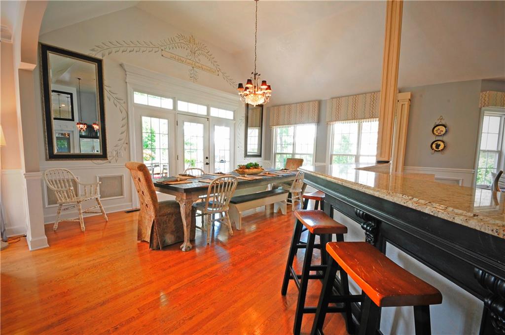 10121 Lakeview Parkway Villa Rica, GA 30180 - Photo 15 of 55 a very nice looking dining room with furniture window and wooden floor
