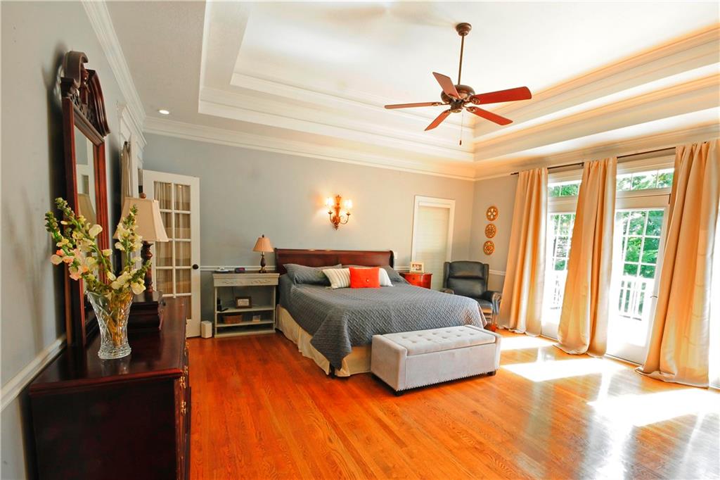 10121 Lakeview Parkway Villa Rica, GA 30180 - Photo 21 of 55 a living room with furniture and a flat screen tv