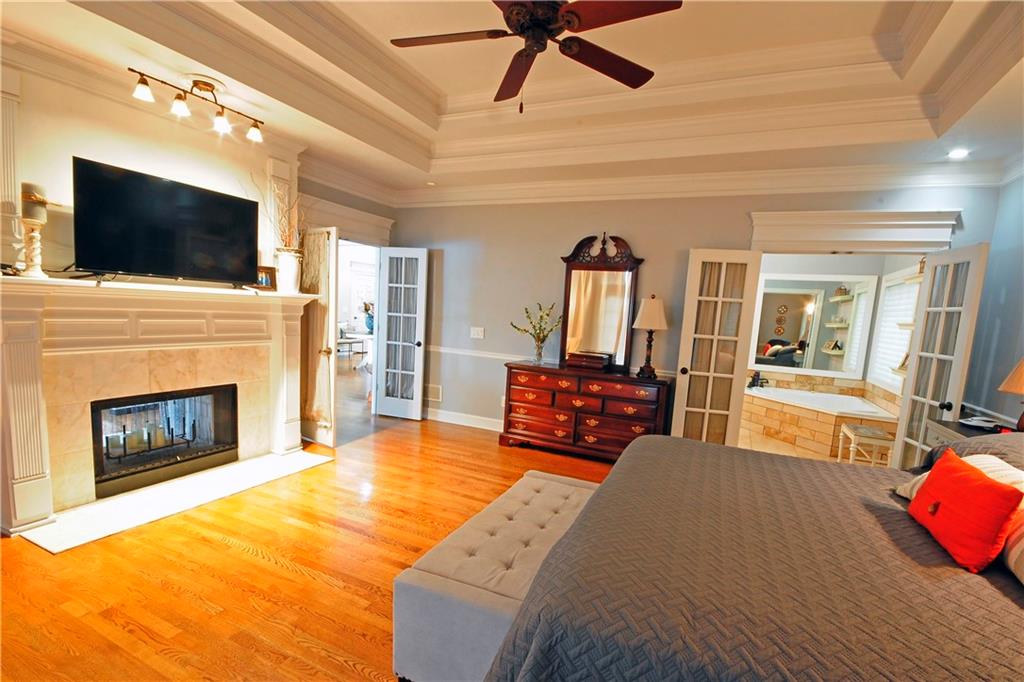 10121 Lakeview Parkway Villa Rica, GA 30180 - Photo 22 of 55 a living room with furniture fireplace and flat screen tv