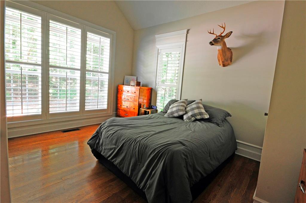 10121 Lakeview Parkway Villa Rica, GA 30180 - Photo 27 of 55 a bedroom with a bed and window