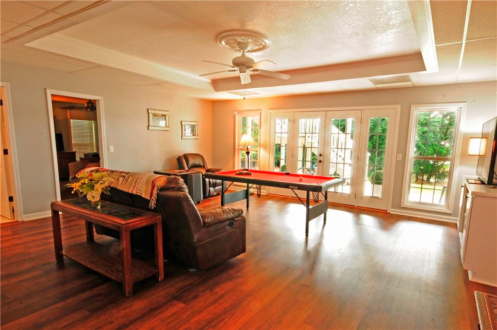 10121 Lakeview Parkway Villa Rica, GA 30180 - Photo 28 of 55 a living room with furniture and a large window