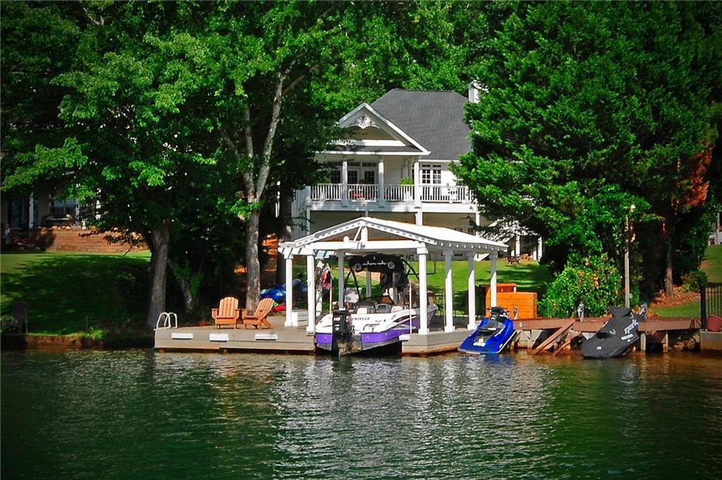 10121 Lakeview Parkway Villa Rica, GA 30180 - Photo 3 of 55 a small garden covered with tall trees