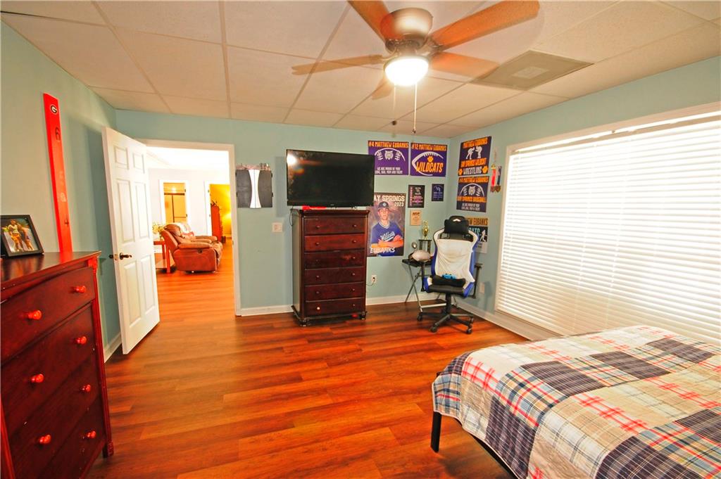 10121 Lakeview Parkway Villa Rica, GA 30180 - Photo 31 of 55 a bed room with a bed and a television
