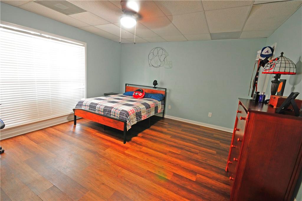 10121 Lakeview Parkway Villa Rica, GA 30180 - Photo 32 of 55 a bedroom with bed and a window