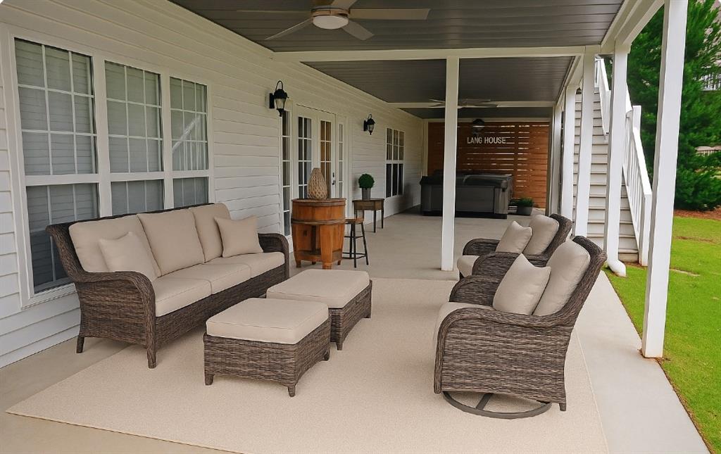 10121 Lakeview Parkway Villa Rica, GA 30180 - Photo 40 of 55 a balcony with furniture and a potted plant