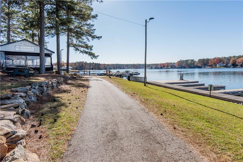 10121 Lakeview Parkway Villa Rica, GA 30180 - Photo 49 of 55 a view of a swimming pool with a lake view