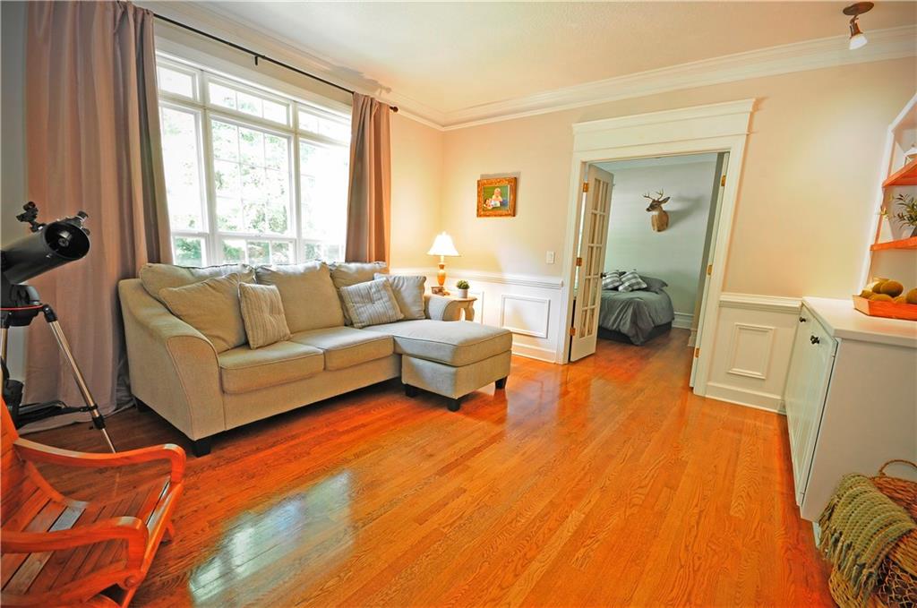 10121 Lakeview Parkway Villa Rica, GA 30180 - Photo 7 of 55 a living room with furniture and a large window