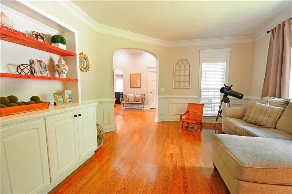 10121 Lakeview Parkway Villa Rica, GA 30180 - Photo 8 of 55 a living room with furniture and a wooden floor