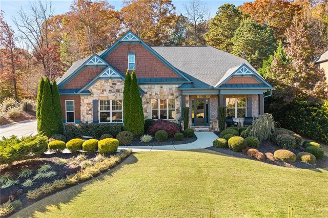 a front view of a house with a porch