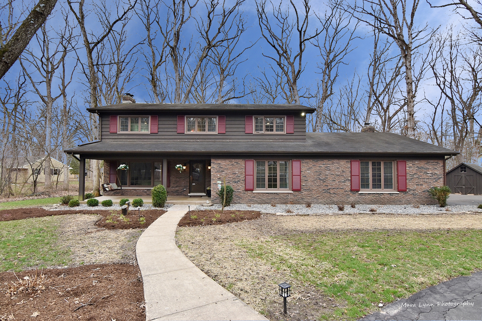 37-w473 Crane Road St. Charles, IL 60175 - Photo 1 of 37 a front view of a building with parking space