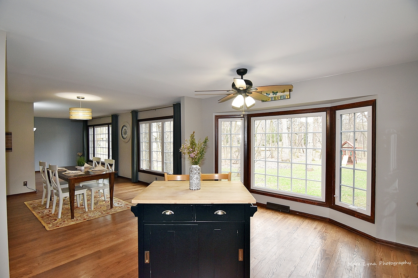 37-w473 Crane Road St. Charles, IL 60175 - Photo 13 of 37 a view of a dining room with furniture a chandelier and wooden floor