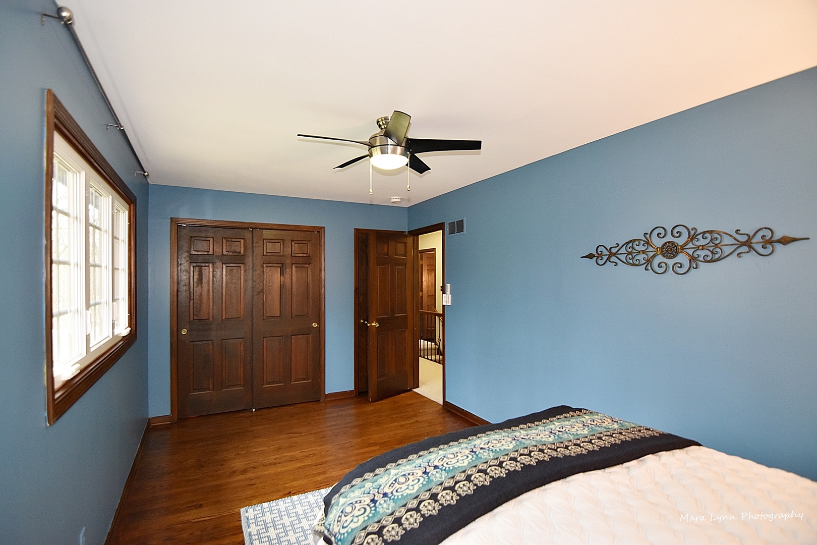 37-w473 Crane Road St. Charles, IL 60175 - Photo 27 of 37 a bedroom with a large bed and a chandelier