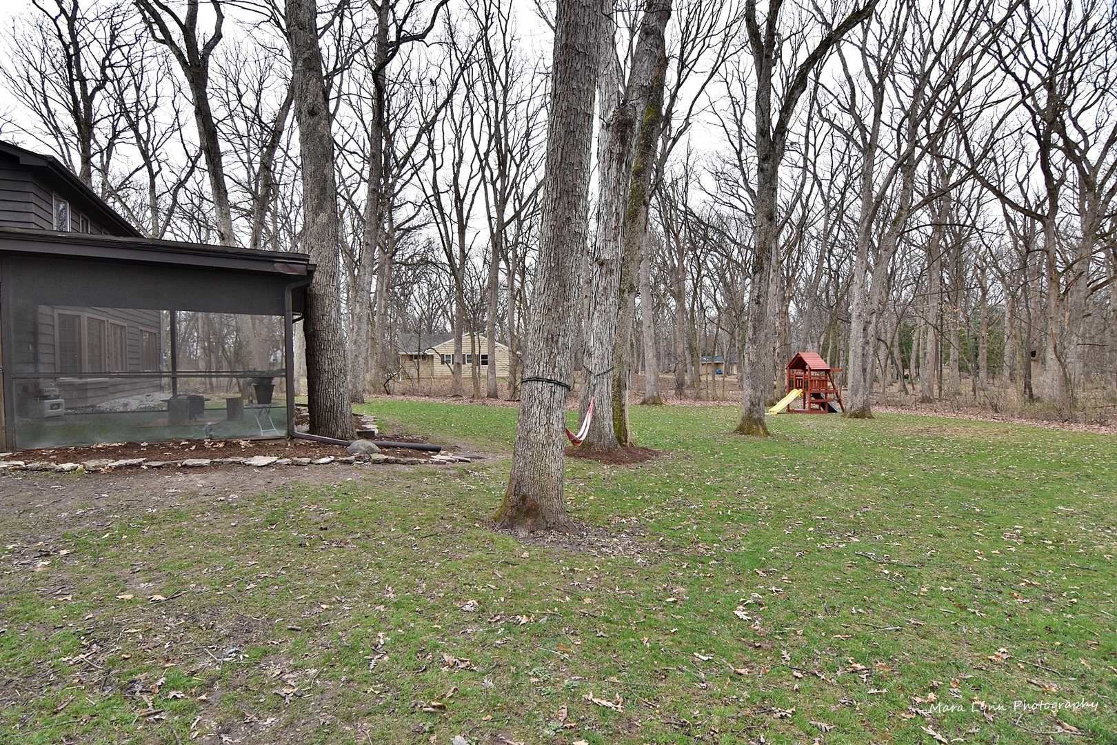 37-w473 Crane Road St. Charles, IL 60175 - Photo 34 of 37 a view of a backyard with large trees
