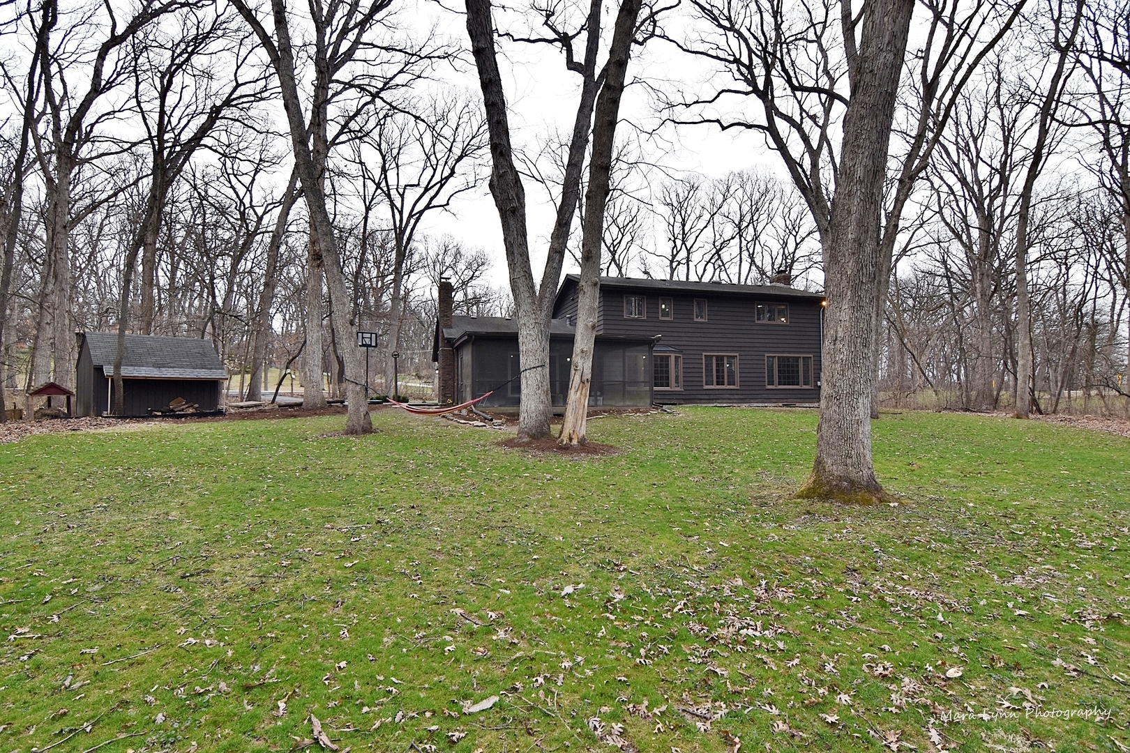 37-w473 Crane Road St. Charles, IL 60175 - Photo 37 of 37 a view of a house with backyard and a tree