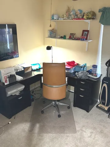 a living room with a couch and a table