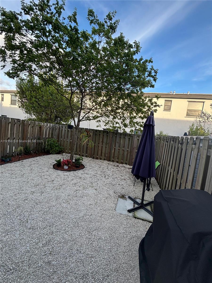 28701 Southwest 132nd Place Homestead, FL 33033 - Photo 16 of 17 a view of backyard with furniture