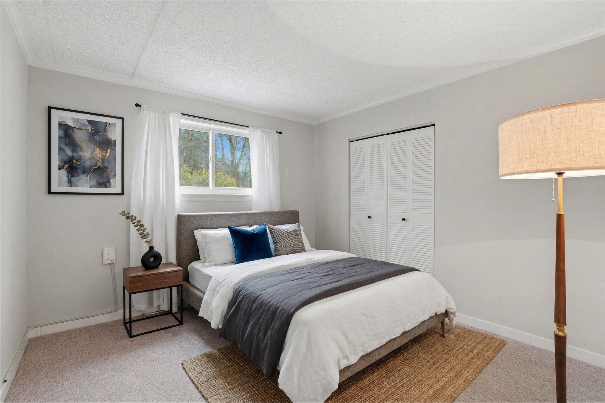 400 Glendale Road, Unit E34 Havertown, PA 19083 - Photo 16 of 31 AI Staged - Serene bedroom with natural light.