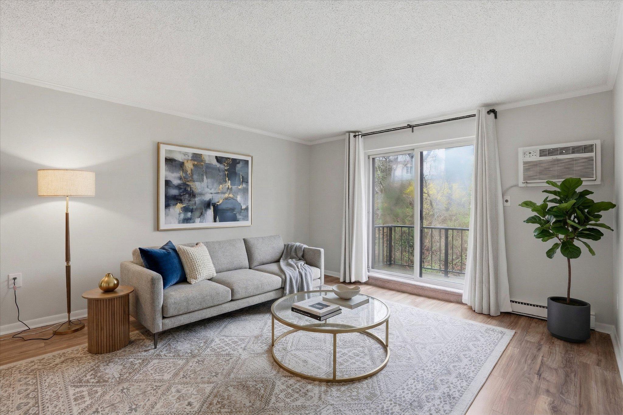 400 Glendale Road, Unit E34 Havertown, PA 19083 - Photo 8 of 31 AI Staged - Bright and inviting living space.