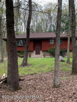 1226 Kroucher Road Stroudsburg, PA 18360 - Photo 2 of 28 a house in middle of forest