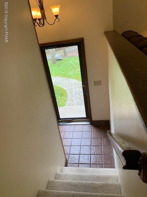1226 Kroucher Road Stroudsburg, PA 18360 - Photo 21 of 28 a view of staircase with a rug
