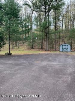 1226 Kroucher Road Stroudsburg, PA 18360 - Photo 26 of 28 a view of a yard with a bench